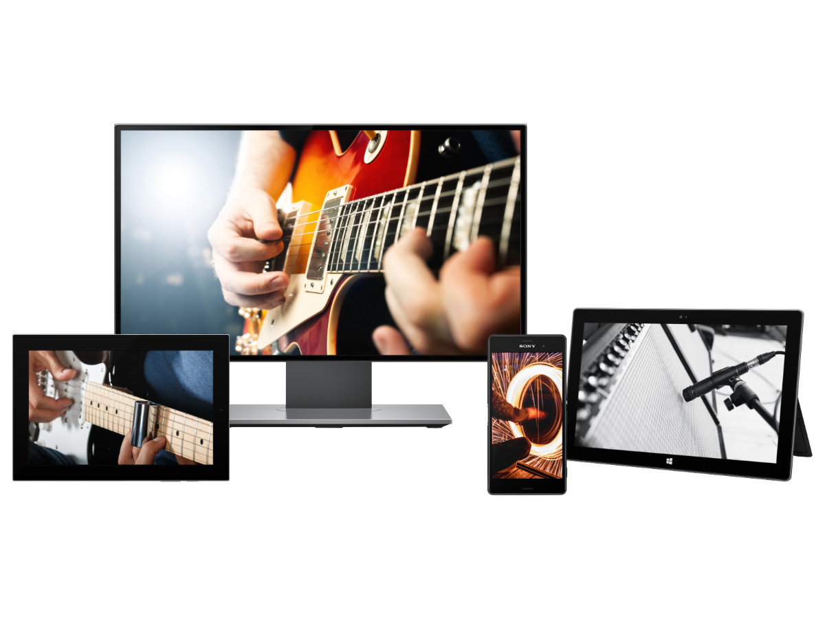 Steal My Secrets lessons playing across a monitor, tablets and a phone